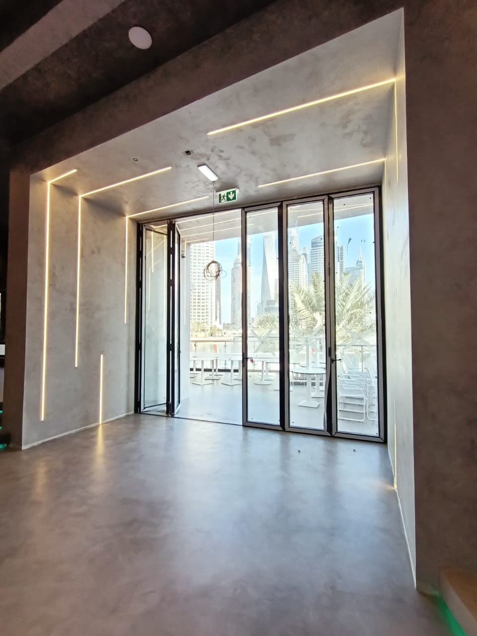Hotel lobby entrance with linear cove lighting