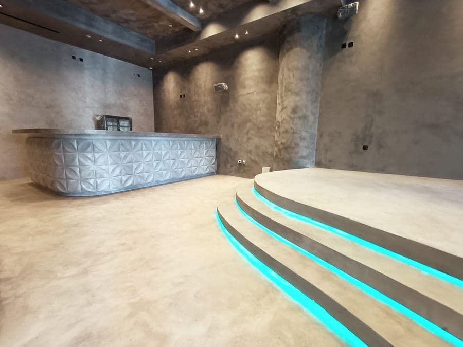 Textured reception desk with glowing steps