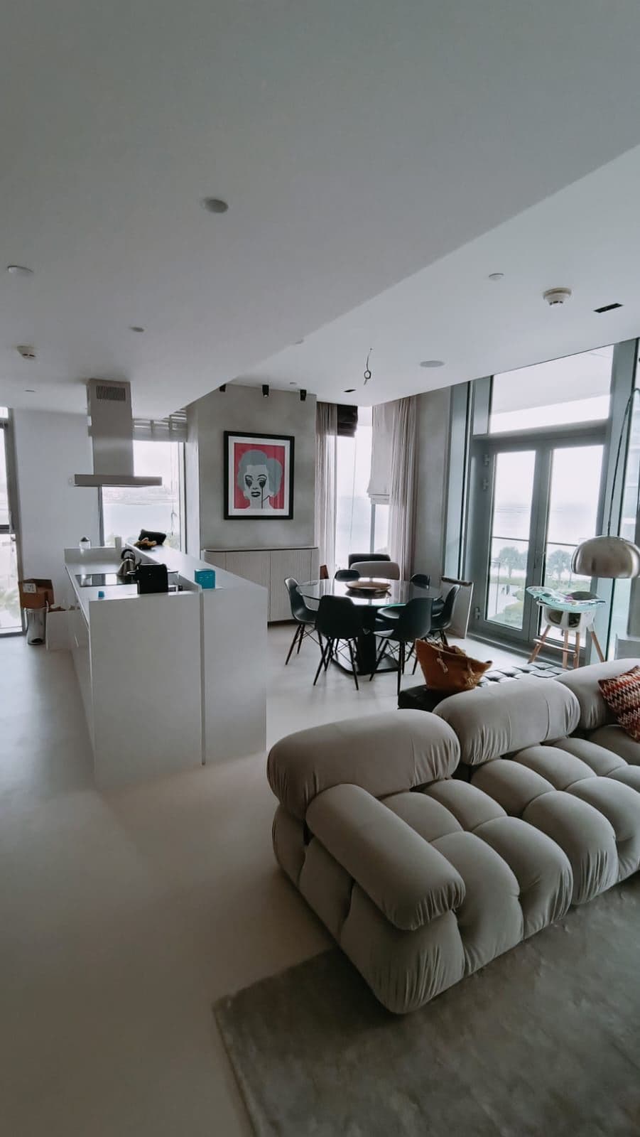 Residential living space with sea view and designer sofa